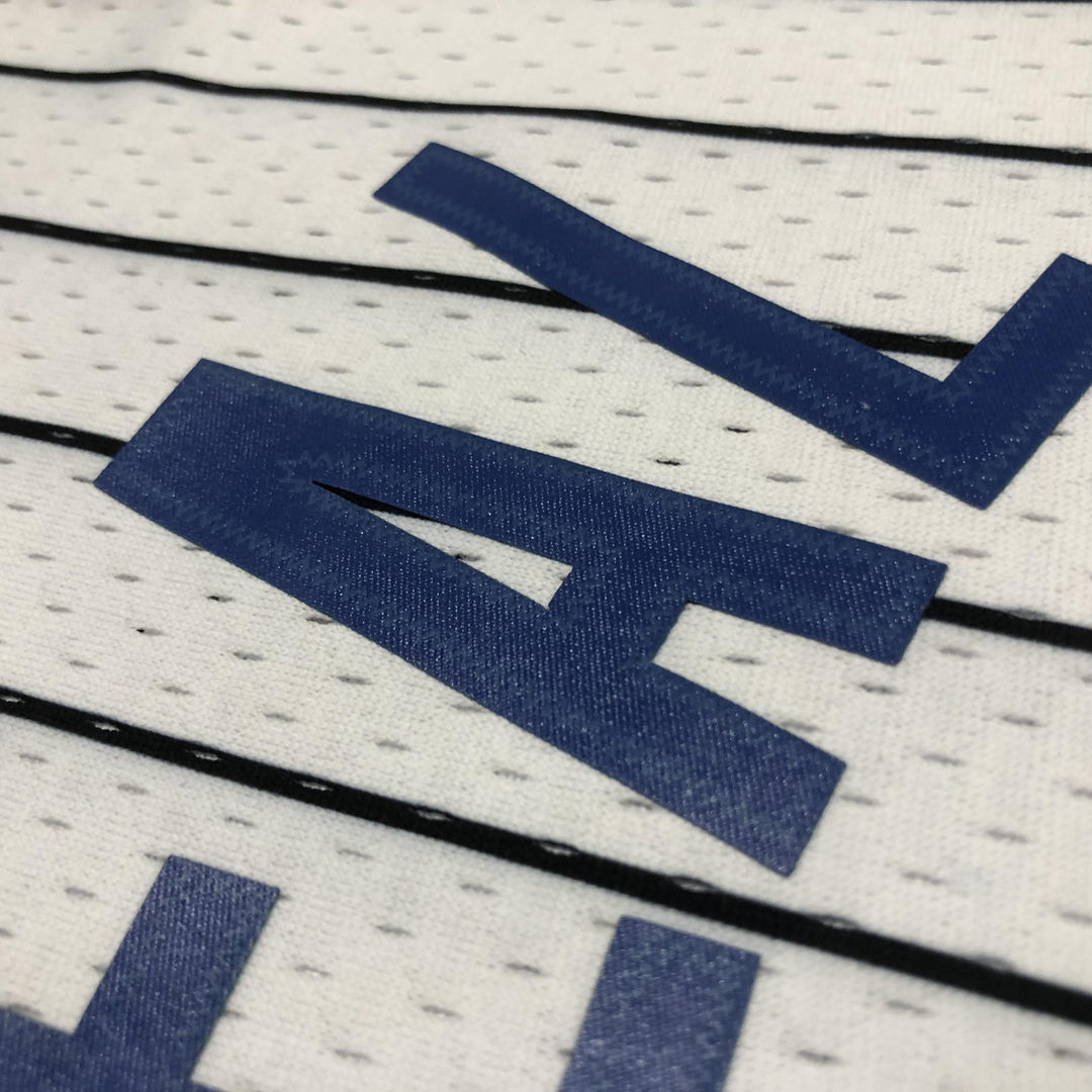 Regata Mitchell & Ness Orlando Magic Shaquille O’Neal 1994-1995 Branca