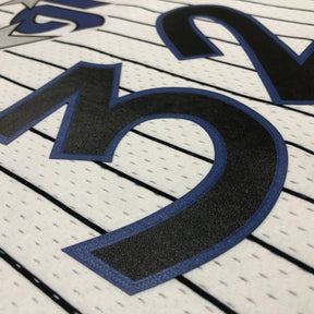 Regata Mitchell & Ness Orlando Magic Shaquille O’Neal 1994-1995 Branca